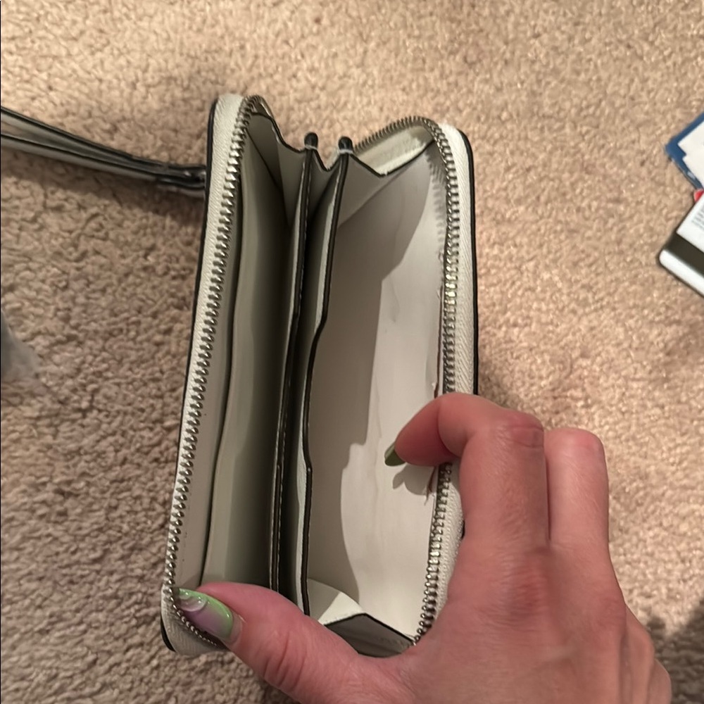 Michael Kors Ivory Wristlet with Silver Accents - Picture 2 of 2